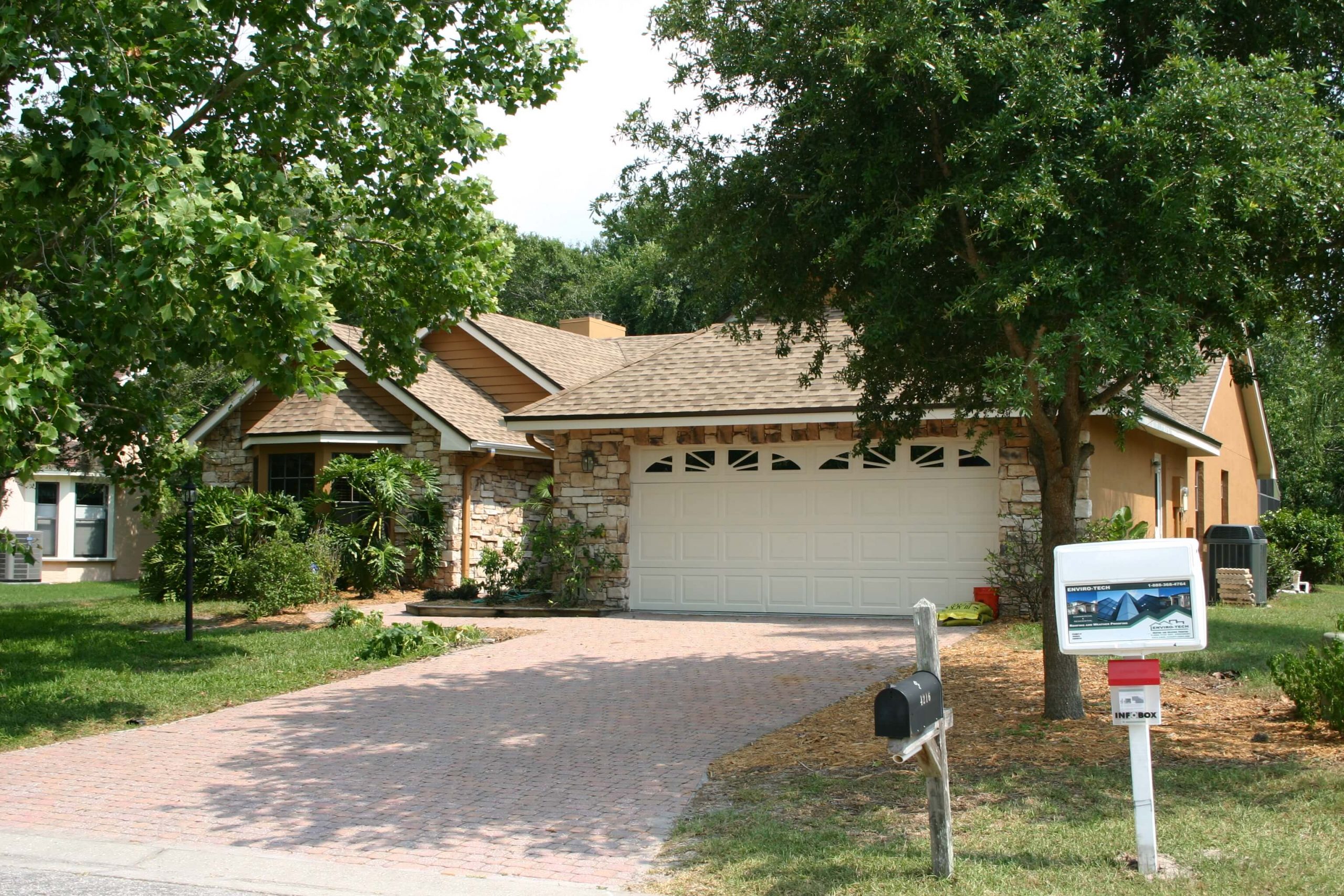 Completed Stone-Front Home Shingle Re-Roof in Manatee County, FL