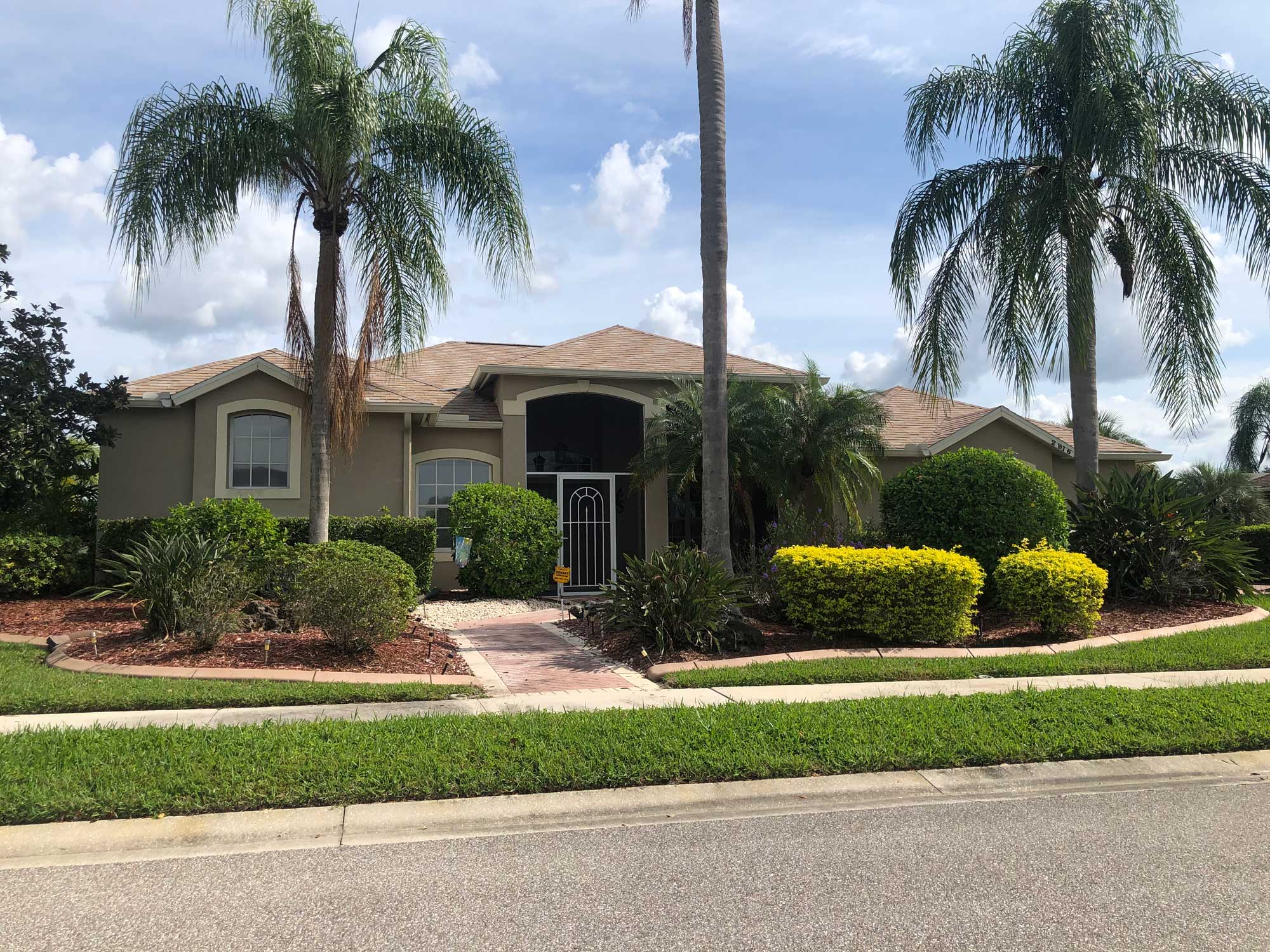 Completed TAMKO Woodgate Shingle Roof in Desert Sand in Sarasota County, FL