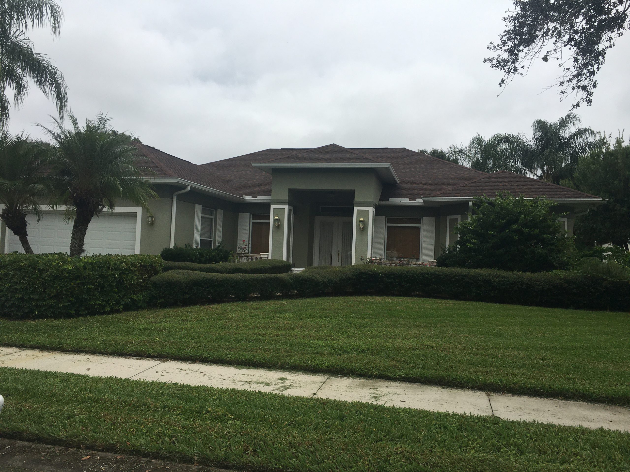 Completed TAMKO Heritage Shingle Roof in Rustic Redwood in Manatee County, FL