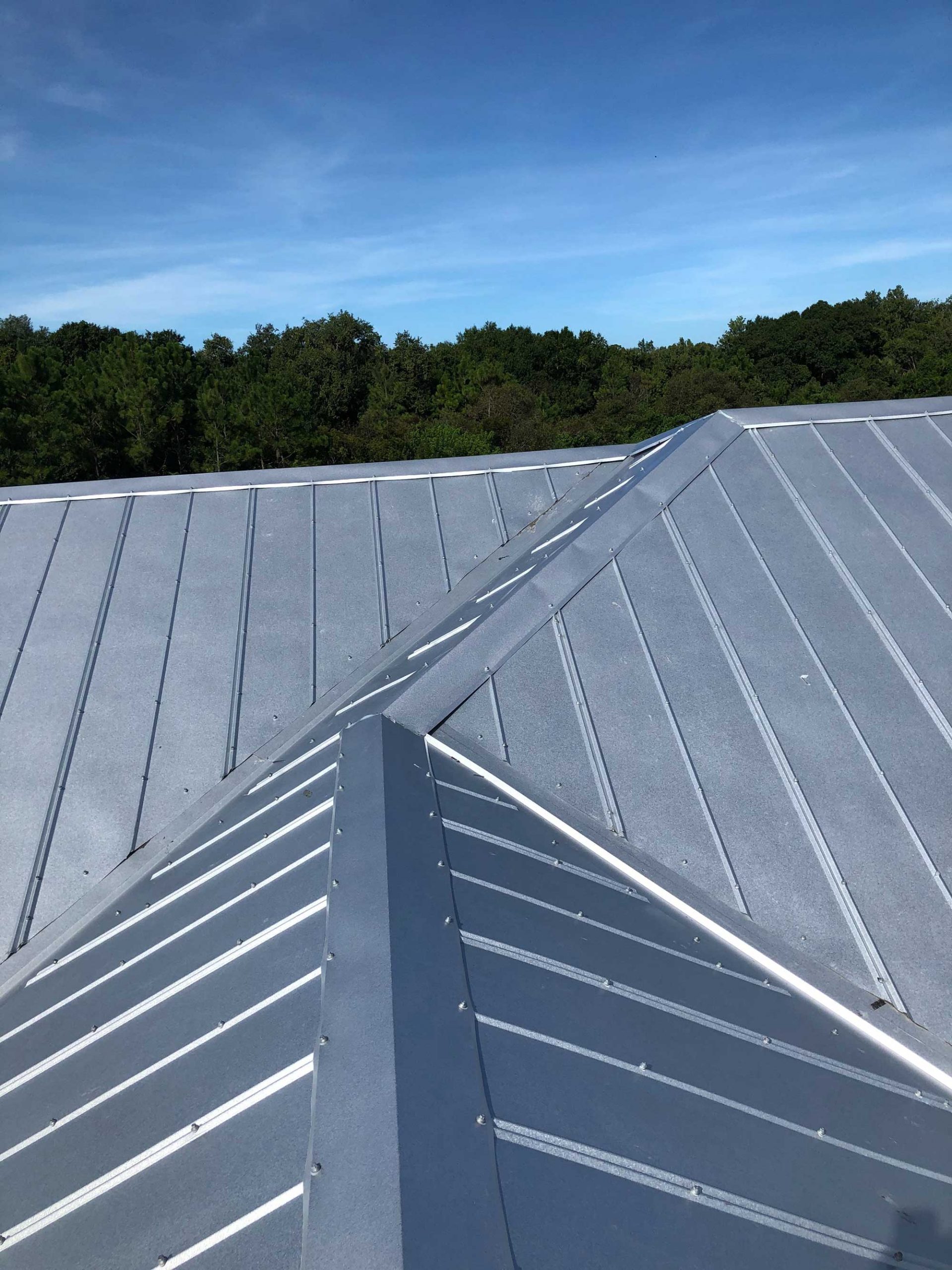 Completed 5V 26 Gauge Mill-Finish Hip Roof in Sarasota County, FL